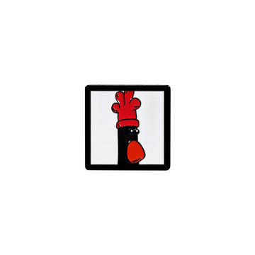 A pin badge featuring an illustration of a character wearing a red feathered hat.